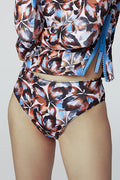 Blue & orange floral print Sasha long-sleeve rashguard & Belle bikini bottom, Flutter Petals