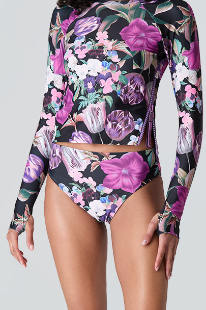 Female model wearing Watskin Sasha tee and Belle bikini bottom in Orchid Bloom