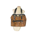 Black and orange cheetah print shoulder bag