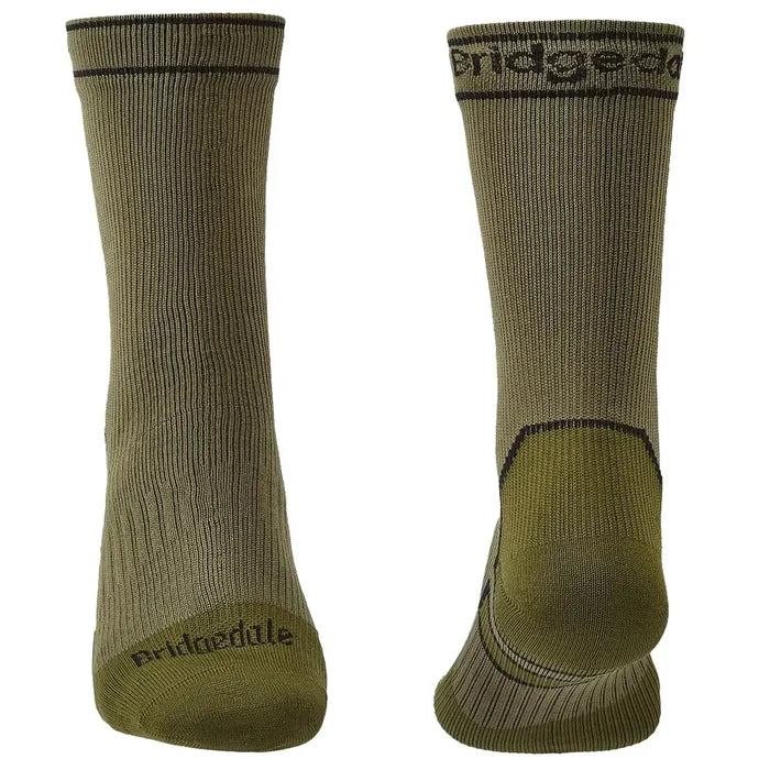 Back and front view of Bridgedale Storm Waterproof Socks Midweight in green/black, highlighting ergonomic fit and moisture-resistant fabric.  from  John Bull Clothing