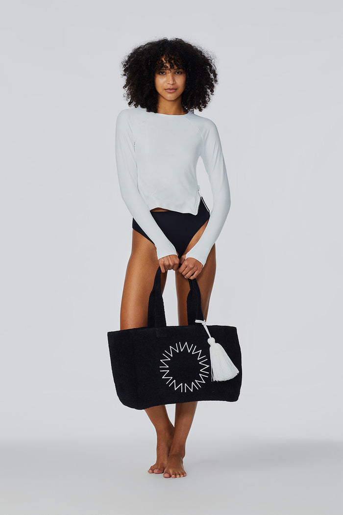 Cabana Beach Bag in Black held by a model