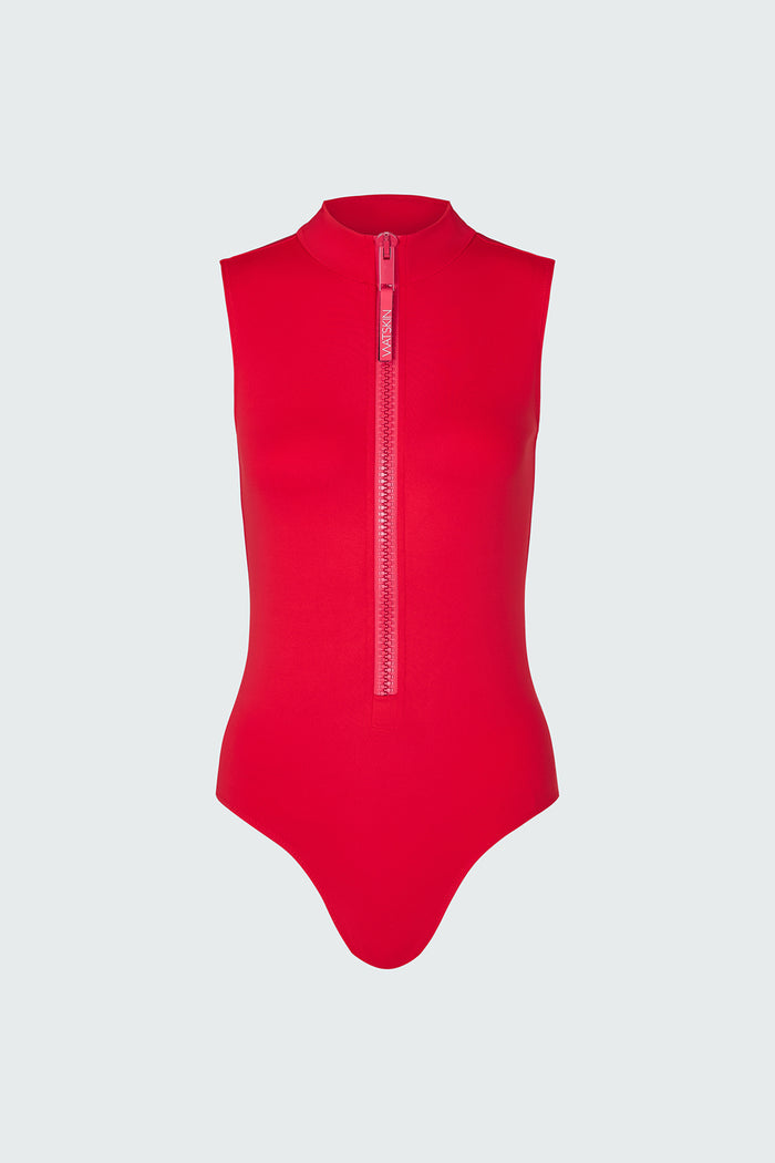 A red sleeveless bodysuit with a  mock neck and half-zip neckline.