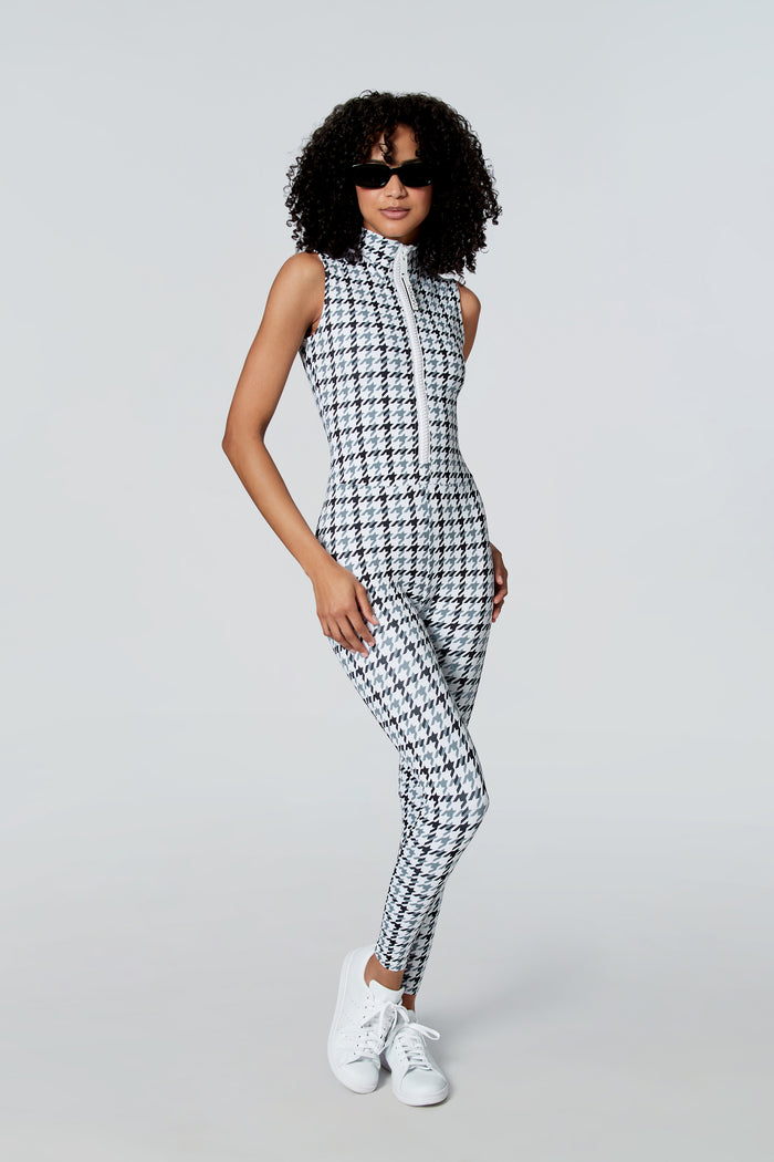 Woman in sunglasses modeling Watskin Chloe sleeveless catsuit in Gray Houndstooth