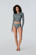 Female modeling Clara rashguard and Belle bikini in Blue Zebra