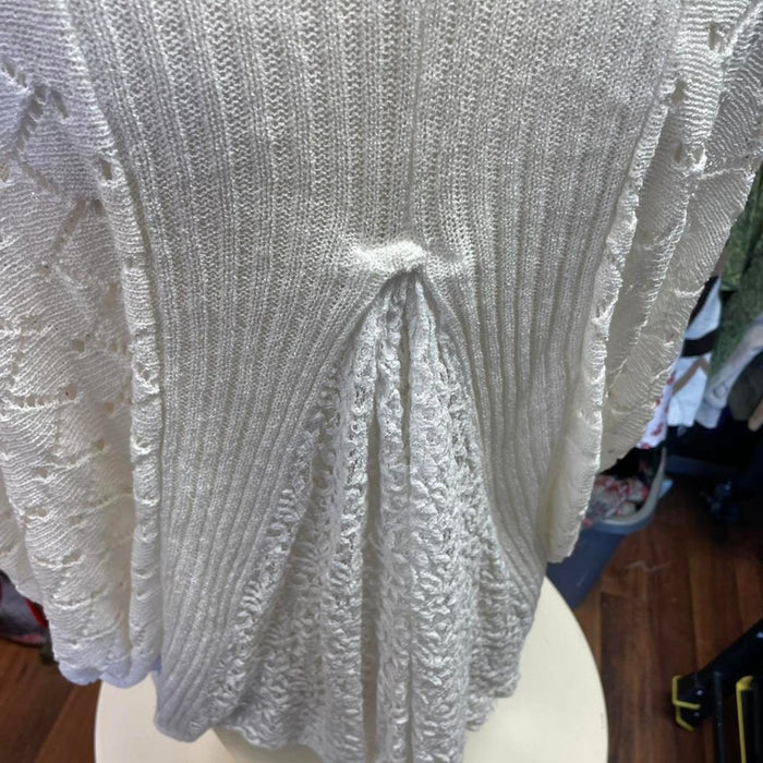 Cream knit cardigan with open