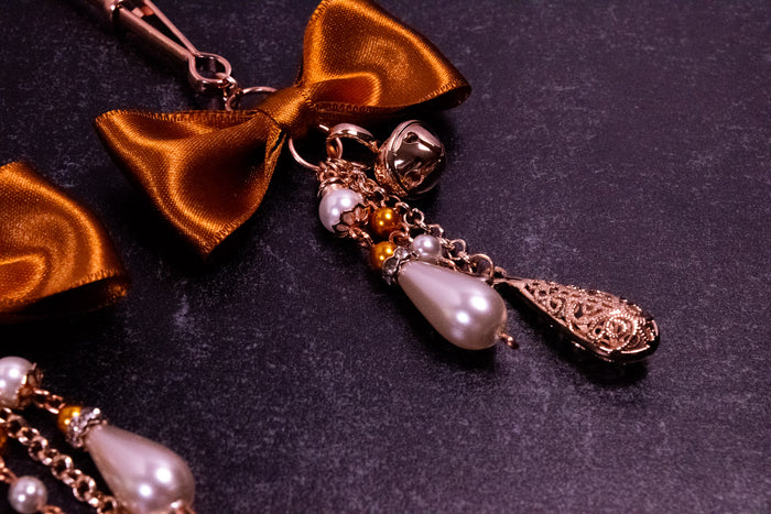Deluxe Caramel Bow Tweezer Nipple Clamps in Rose Gold