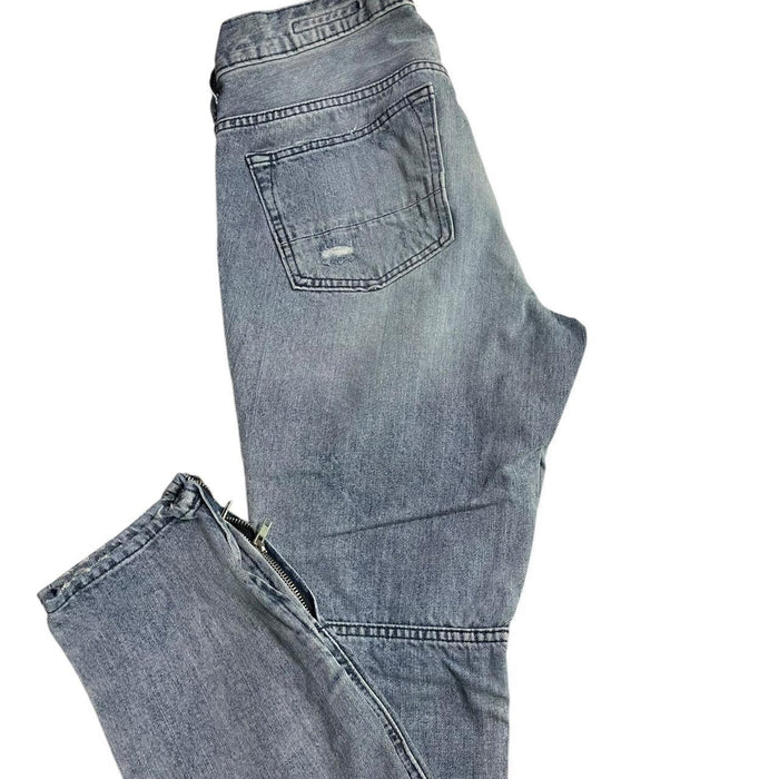 Distressed blue ripped jeans
