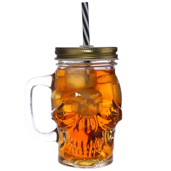 glass skull drinking jar with metal lid and straw filled drink display