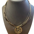 Gold and black beaded necklace