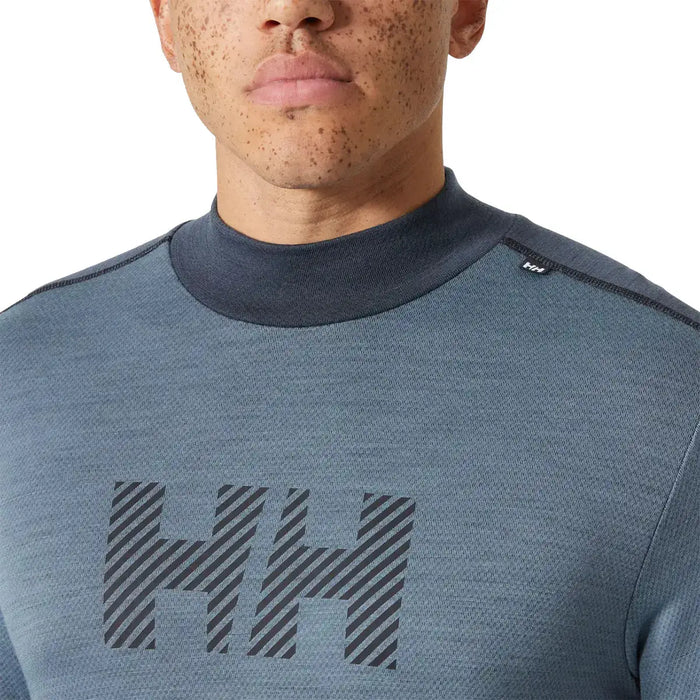 Zoomed-in view of Helly Hansen Lifa Midweight Logo Merino Base Layer chest logo and collar, emphasizing branding and soft merino blend fabric.  from  John Bull Clothing