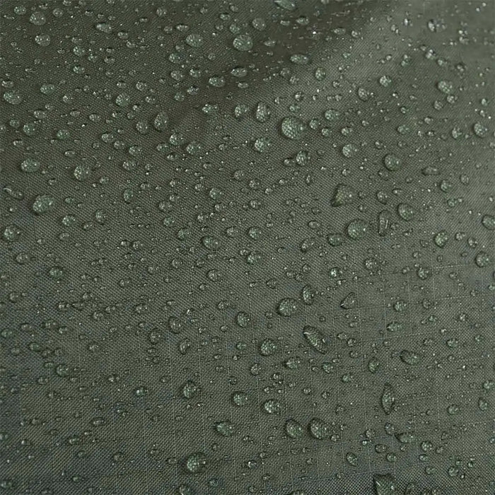 Close-up of the Highlander Rucksack Cover 80-90L in Olive Green with water droplets, showcasing its waterproof material for ultimate weather protection.  from  John Bull Clothing