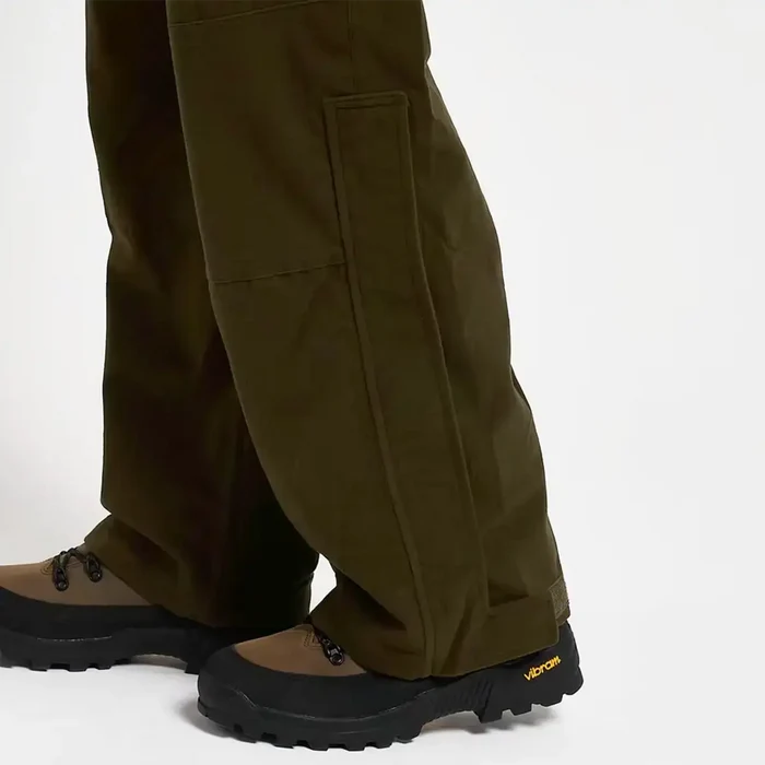 Zoomed-in view of leg hem and boot compatibility of Jack Pyke Hunters Trousers Green Waterproof, built for rugged outdoor use.  from  John Bull Clothing