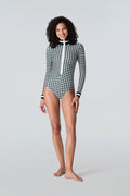 Woman wearing Watskin Lilia bodysuit in black/ivory houndstooth