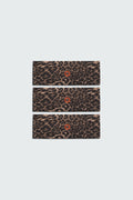 Close up photo of a set of three Watskin Lilly headbands in Leopard against a white background. Each features a small red sun logo in the center.
