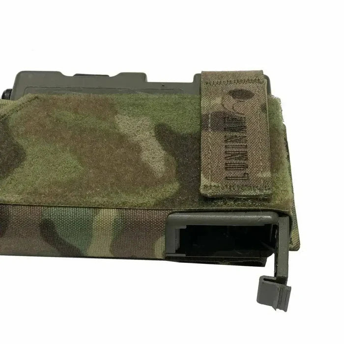 Close-up of the Luminae Multicam PRR Pouch MTP highlighting its reinforced opening and adjustable strap for easy radio access.  from  John Bull Clothing