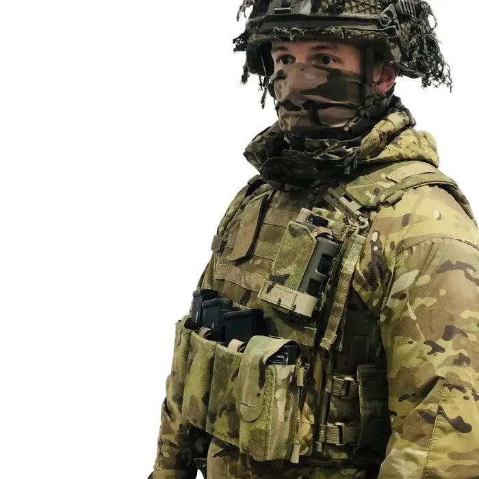 Soldier wearing the Luminae Multicam PRR Pouch MTP attached to tactical vest, demonstrating its practical use in military operations.  from  John Bull Clothing