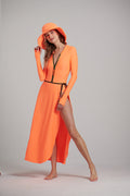 Nadia in the Watskin Olivia Wrap Skirt and Sienna Hat in Orange