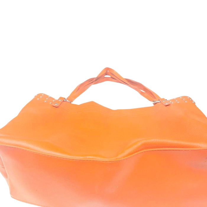 Orange leather tote bag with broken zipper
