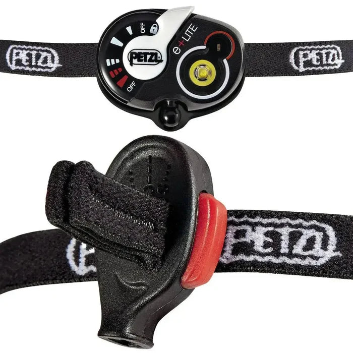 Close-up of Petzl E+Lite Compact Emergency Head Torch showing control dial and elastic headband with secure adjustment system for hands-free lighting.  from  John Bull Clothing