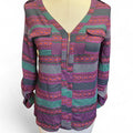 Purple and green patterned blouse
