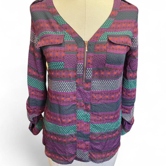 Purple and green patterned blouse