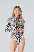 Woman wearing Watskin Ryann bodysuit in Natural Zebra against a plain background