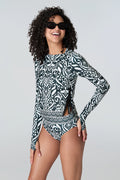 Woman in sunglasses wearing Watskin Sasha tee and Belle briefs in Black Ikat
