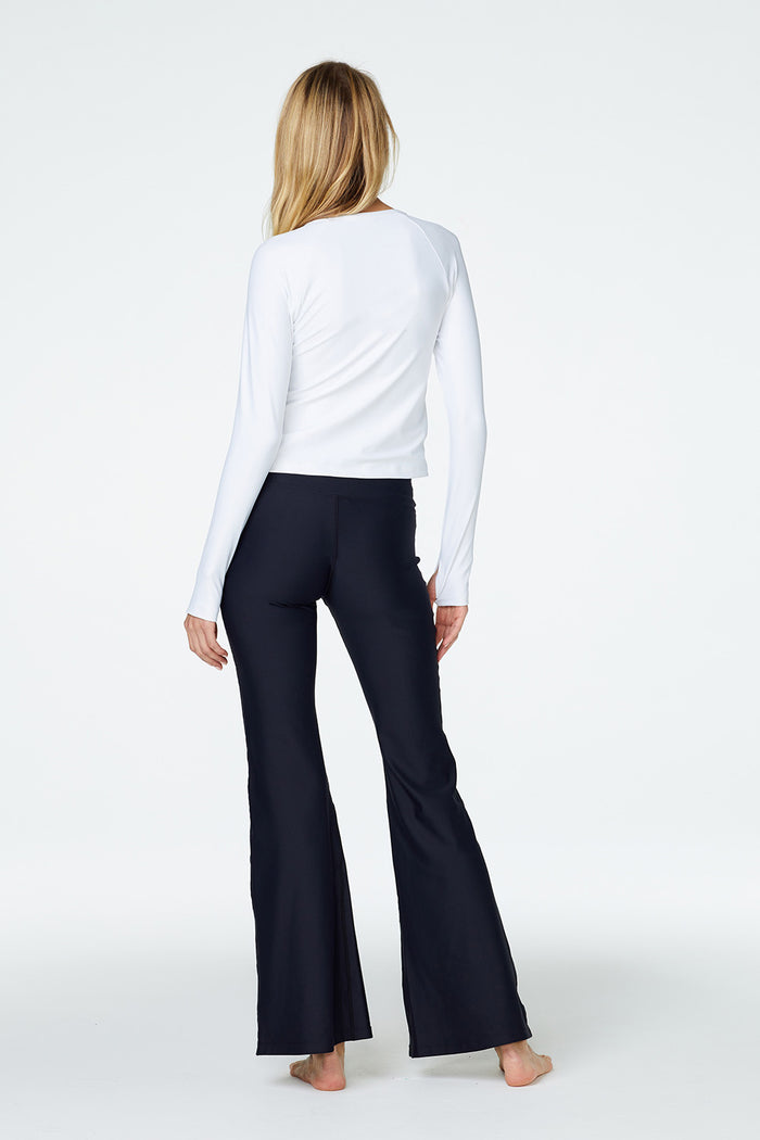 Rear view of woman wearing Watskin Sasha tee in White and Juliette palazzo pant in Black