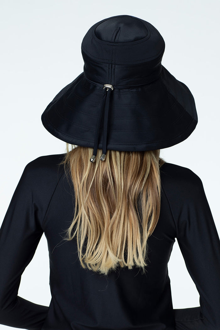 Back view of woman modeling Watskin Sienna Hat and Sasha tee in Black