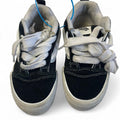 Vans black and white skateboarding